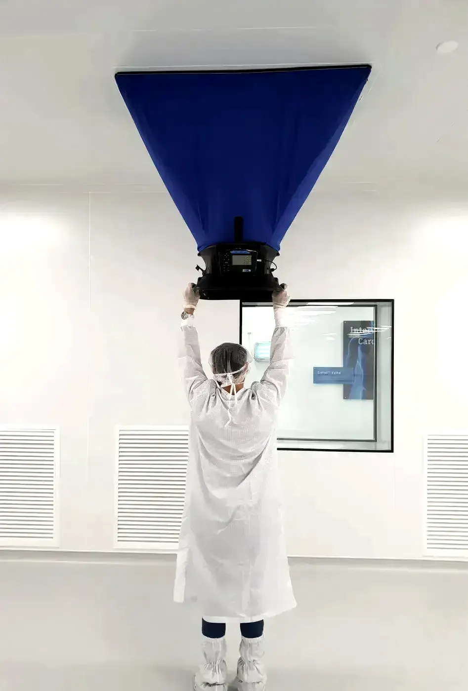 Flow-capture hood measuring HEPA supply airflow